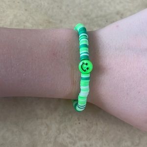 Mixed match green smiley face clay bead bracelet handmaid